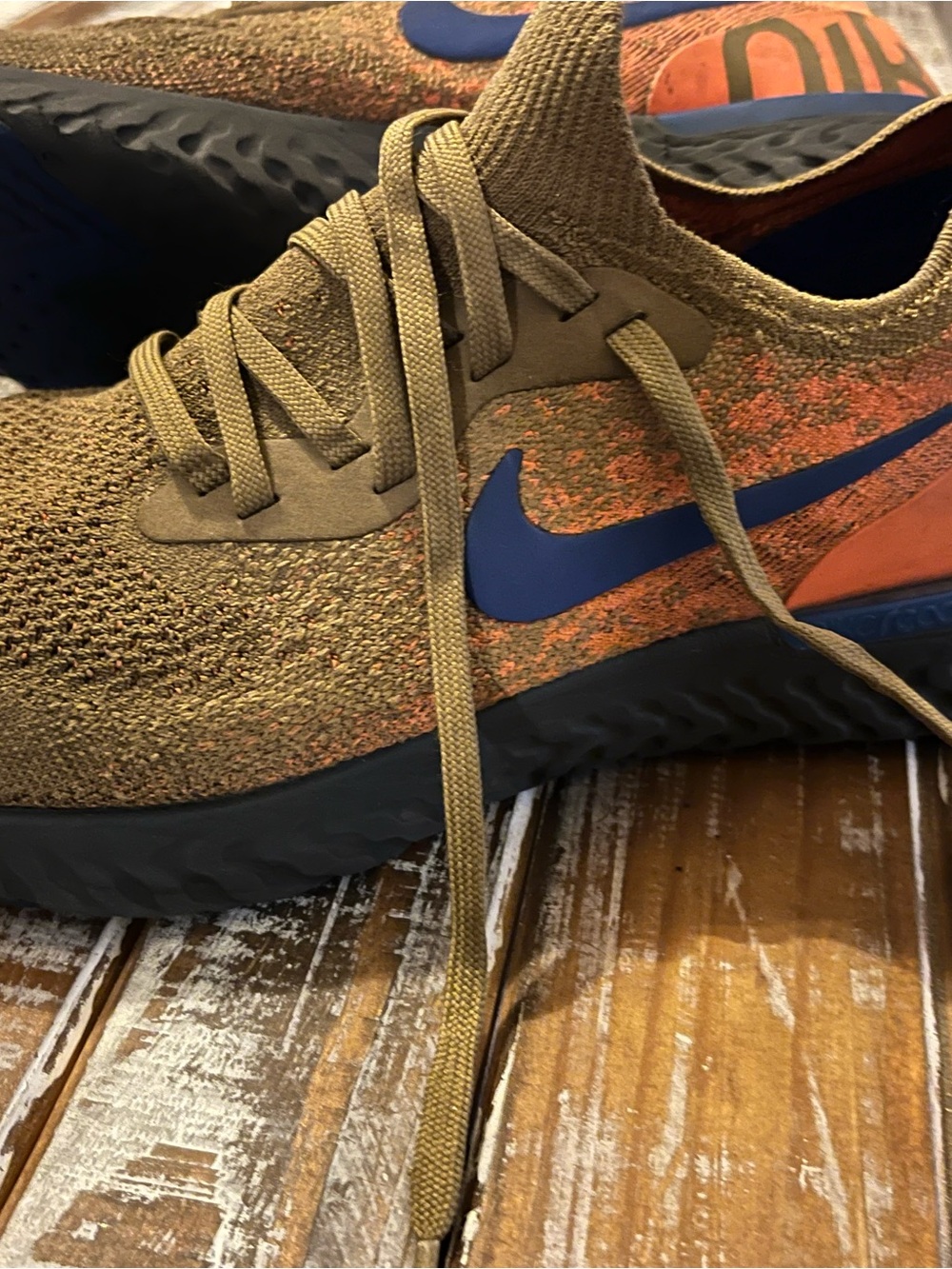 Nike Olive Knit Running Shoes with Blue Swoosh and Orange Accents